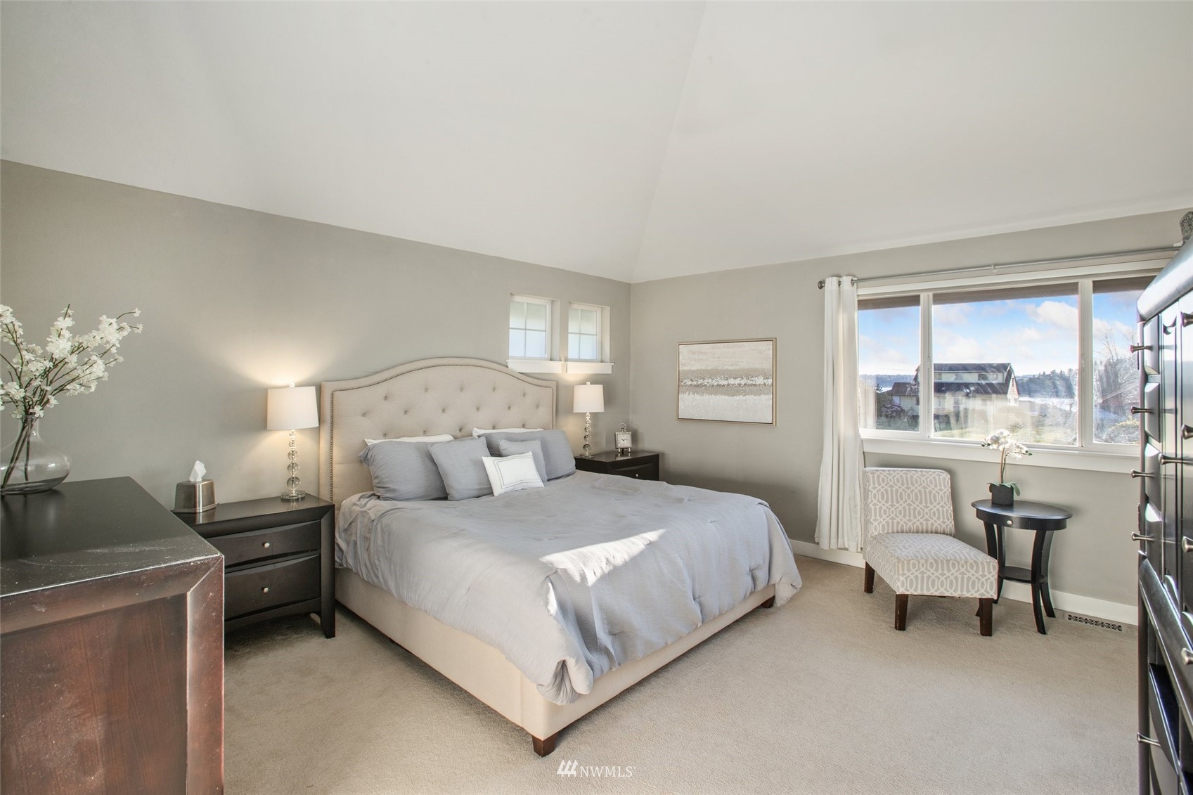 1328 North 39th Street Renton, WA 98056 - Photo 18 of 40 a bedroom with a bed and a table