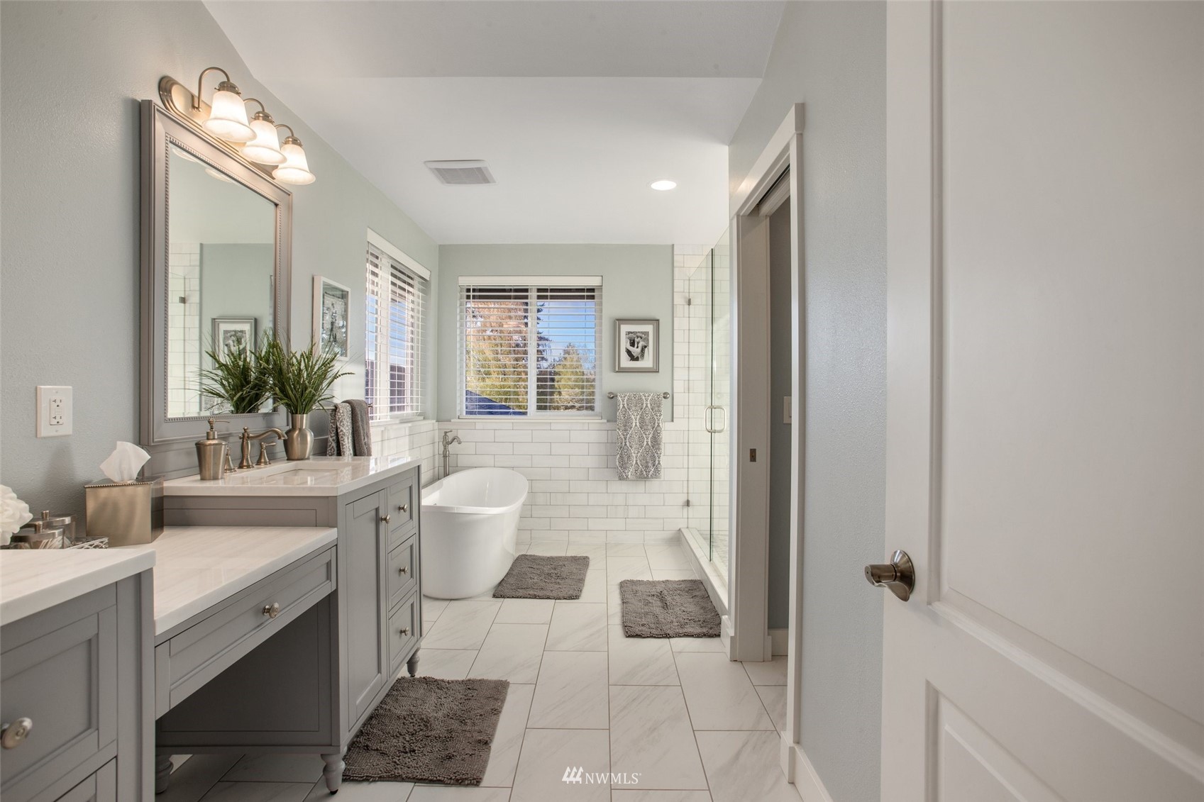 1328 North 39th Street Renton, WA 98056 - Photo 20 of 40 a spacious bathroom with a double vanity sink toilet and shower