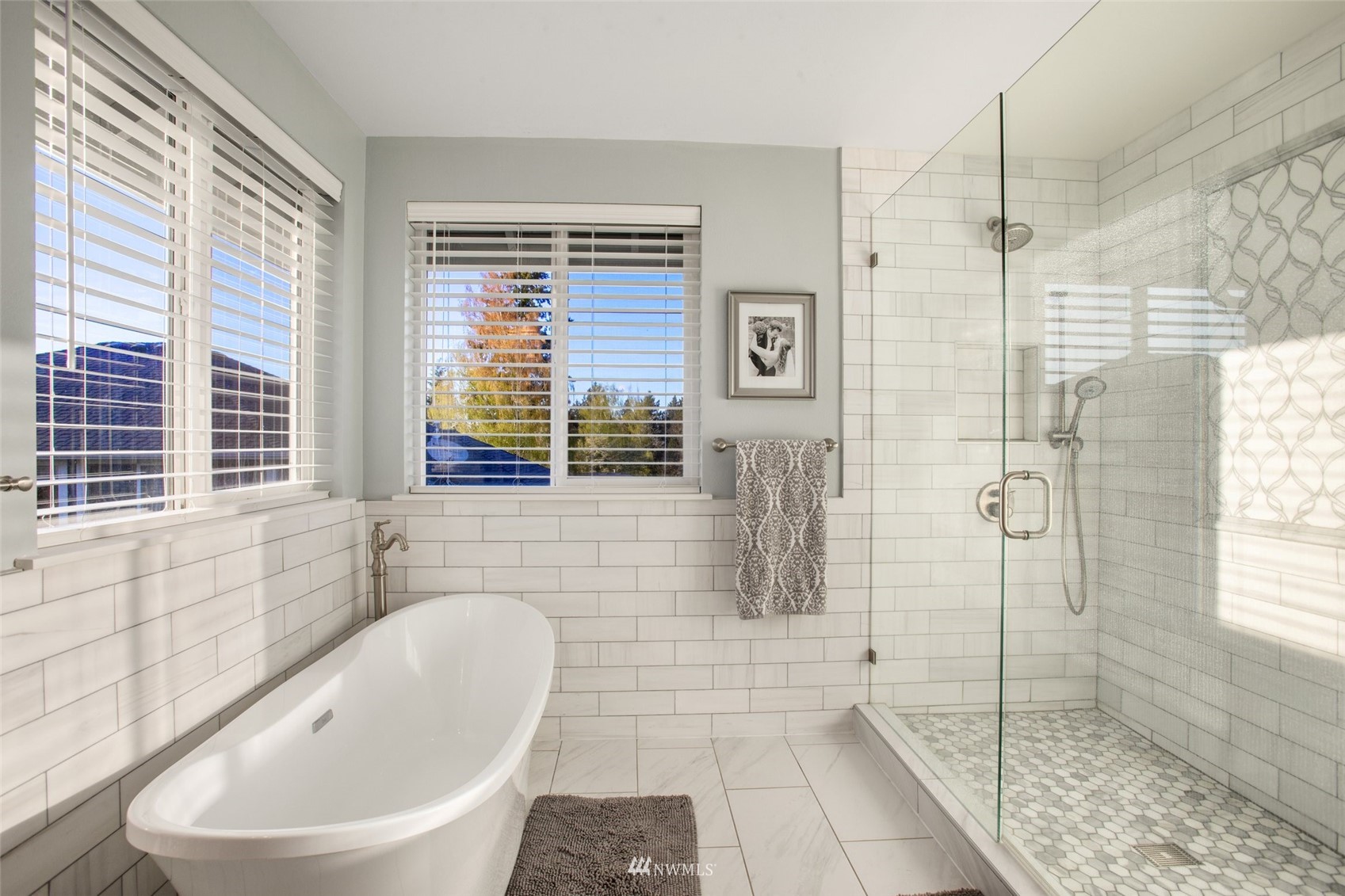 1328 North 39th Street Renton, WA 98056 - Photo 21 of 40 a bathroom with a bathtub and a shower