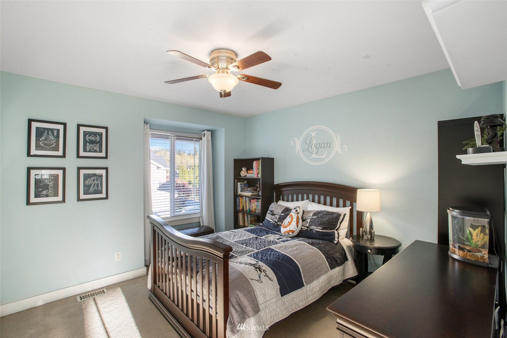 1328 North 39th Street Renton, WA 98056 - Photo 26 of 40 a bedroom with a bed and wooden floor