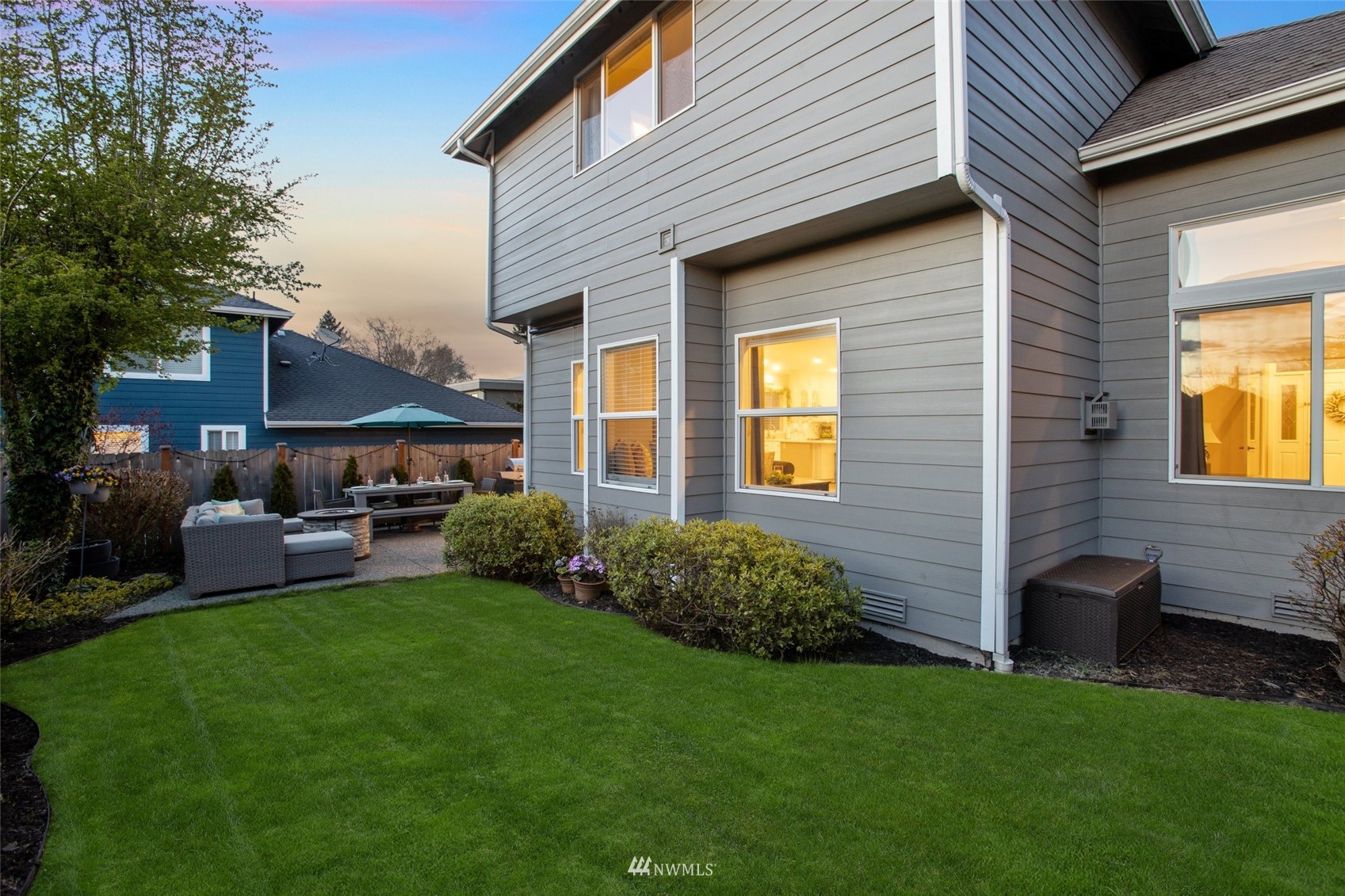 1328 North 39th Street Renton, WA 98056 - Photo 33 of 40 a backyard of a house with table and chairs