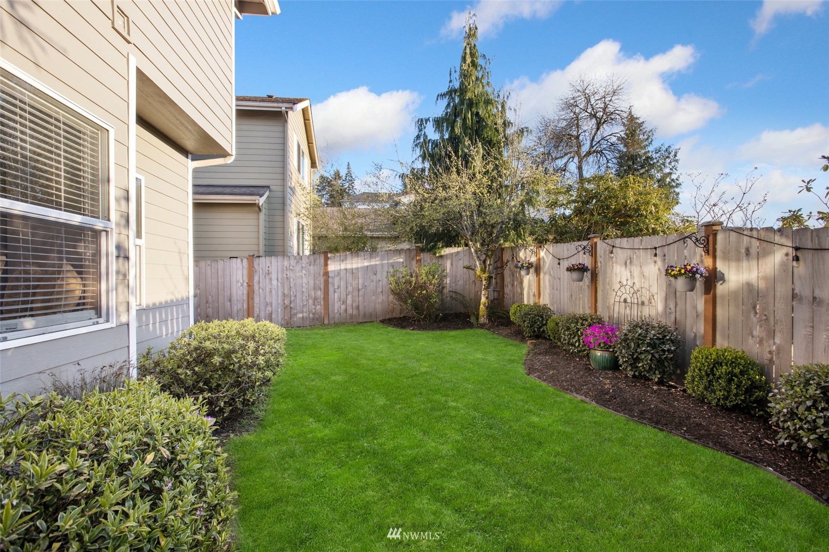 1328 North 39th Street Renton, WA 98056 - Photo 34 of 40 a view of a backyard with garden