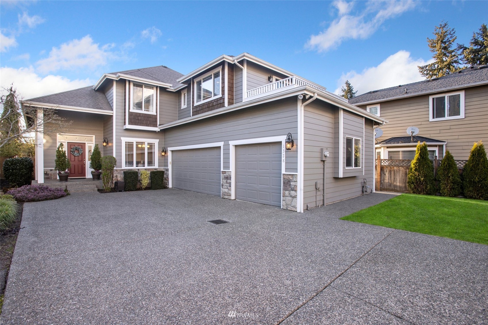 1328 North 39th Street Renton, WA 98056 - Photo 39 of 40 a view of a house with a yard and large tree