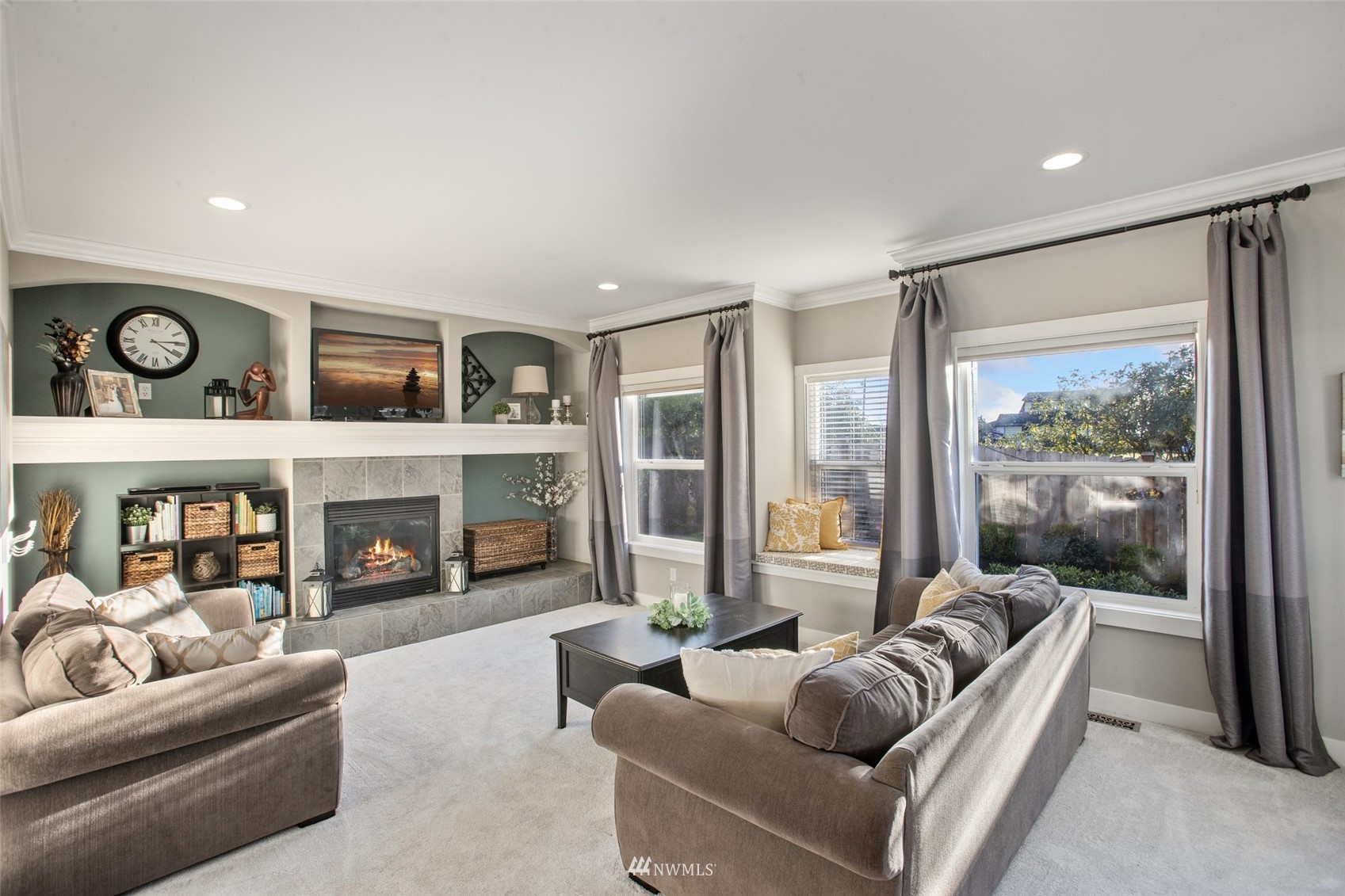 1328 North 39th Street Renton, WA 98056 - Photo 7 of 40 a living room with furniture fireplace and a large window