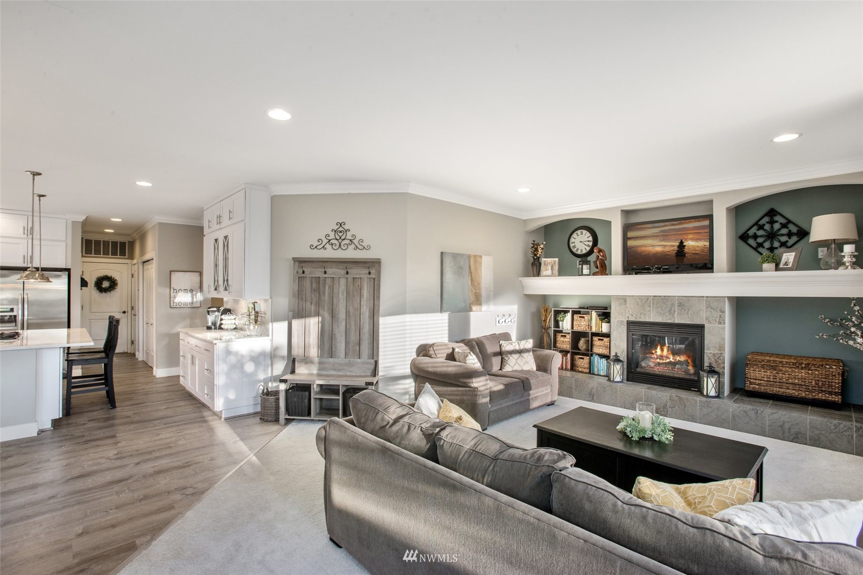 1328 North 39th Street Renton, WA 98056 - Photo 9 of 40 a living room with fireplace furniture and a wooden floor
