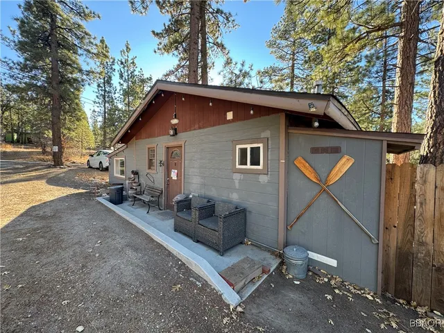 a backyard of a house with seating space