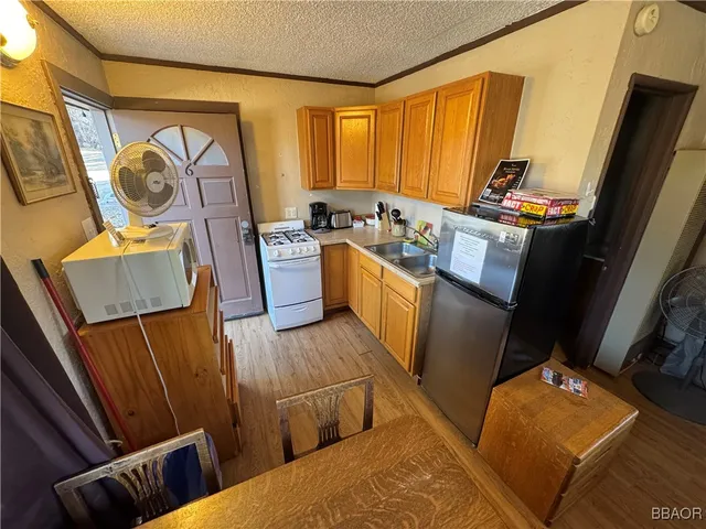 a bathroom with a toilet and shower