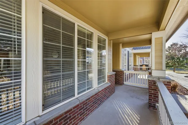 a view of a living room and balcony