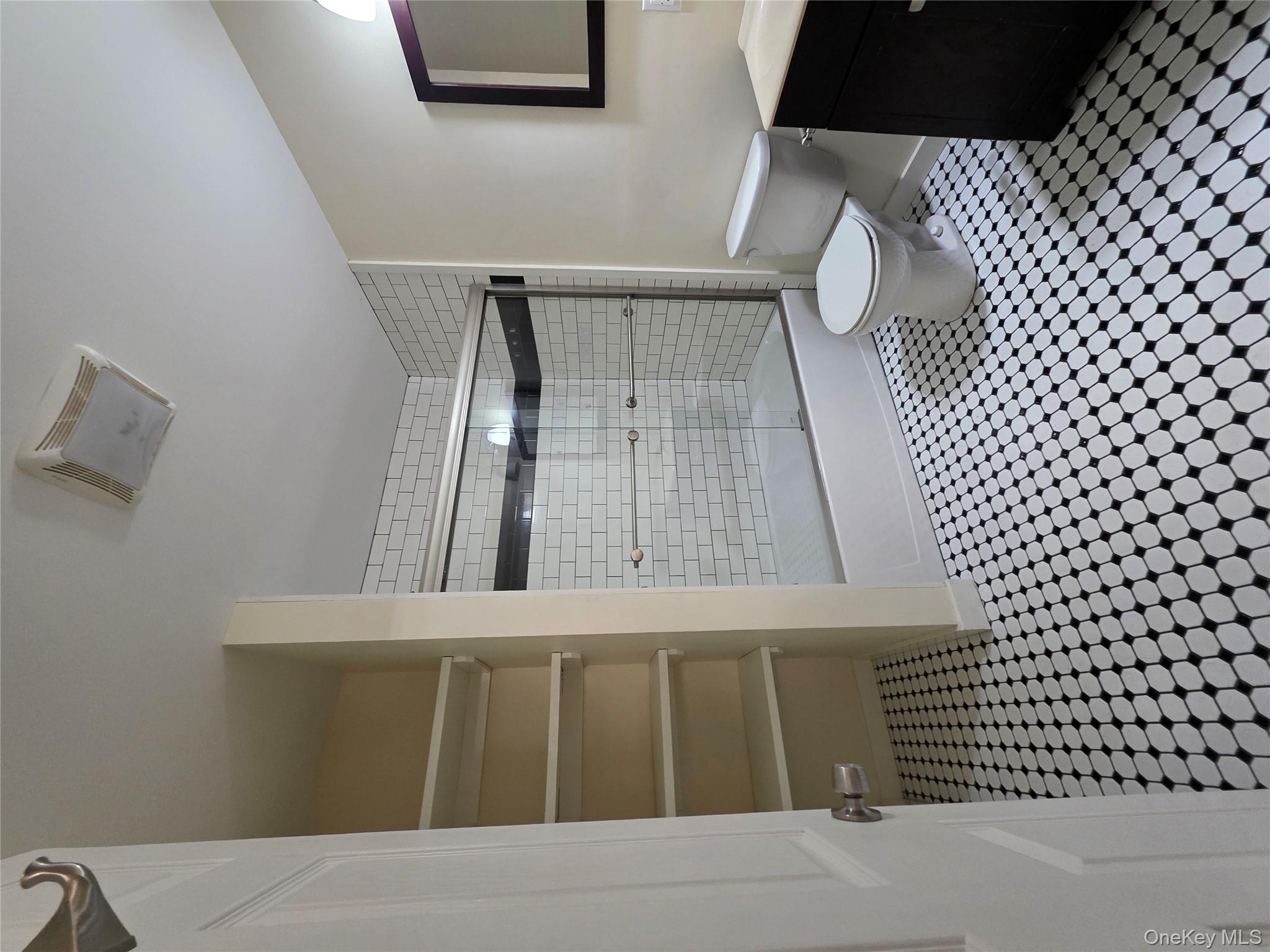 231 Reynolds Road, Unit 9 Fallsburg, NY 12759 - Photo 5 of 15 Bathroom featuring vanity and shower / bath combination with glass door