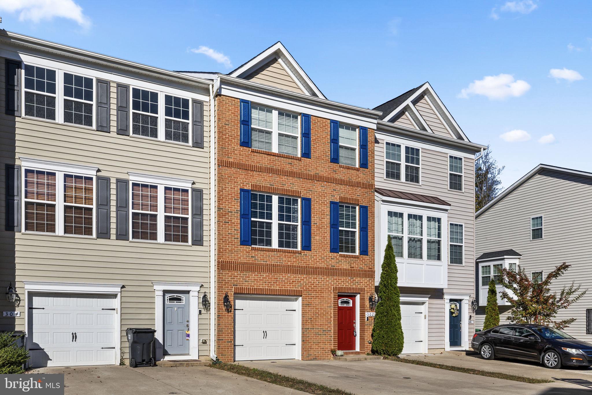 302 Tree Line Drive Fredericksburg, VA 22405 - Photo 2 of 38 a front view of a house with a tree