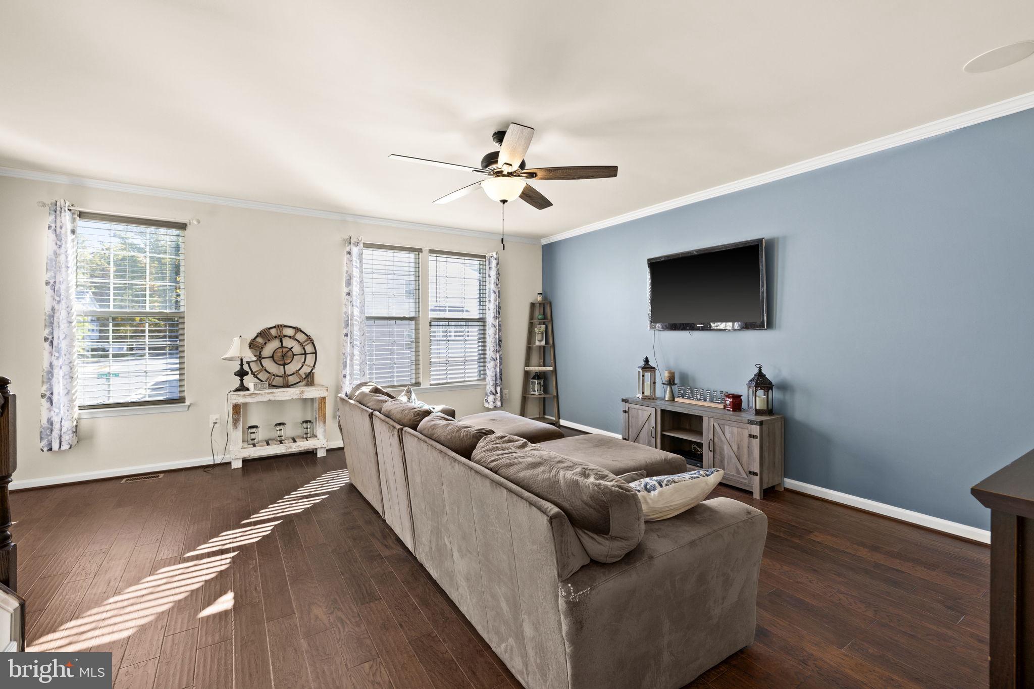 302 Tree Line Drive Fredericksburg, VA 22405 - Photo 26 of 38 a living room with furniture a flat screen tv and a large window