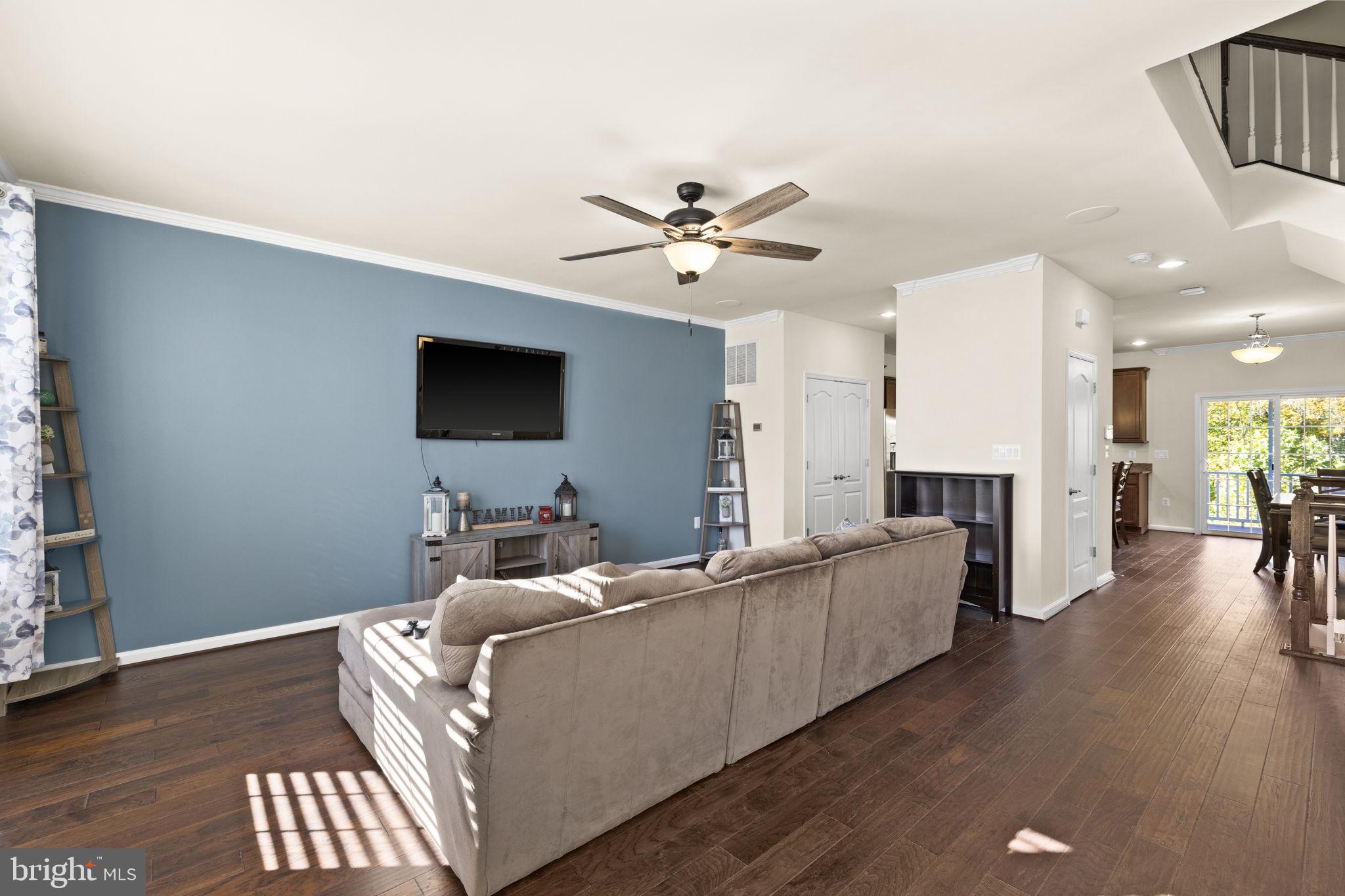 302 Tree Line Drive Fredericksburg, VA 22405 - Photo 27 of 38 a living room with furniture fireplace and a flat screen tv