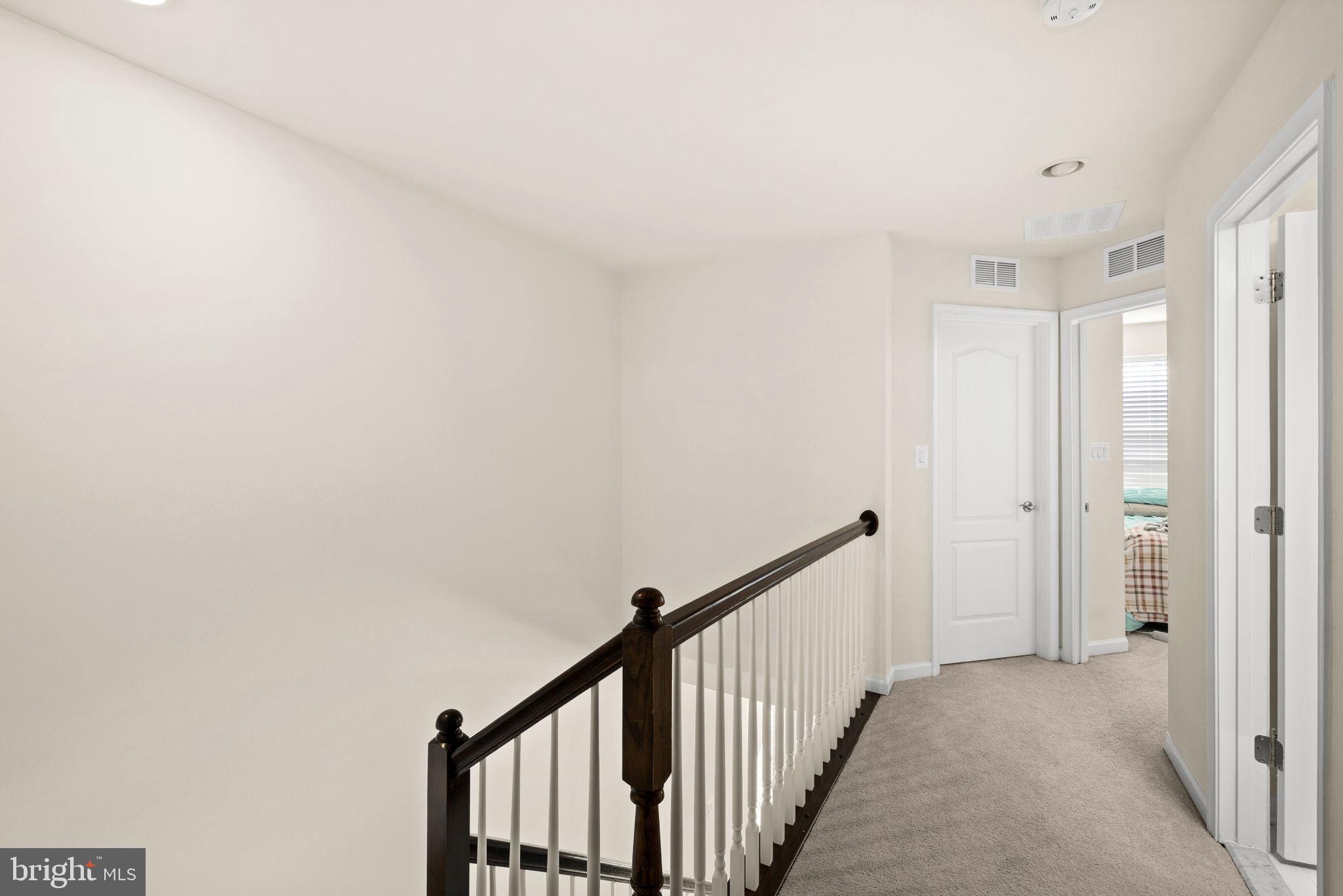 302 Tree Line Drive Fredericksburg, VA 22405 - Photo 29 of 38 a view of a hallway with wooden floor and entryway