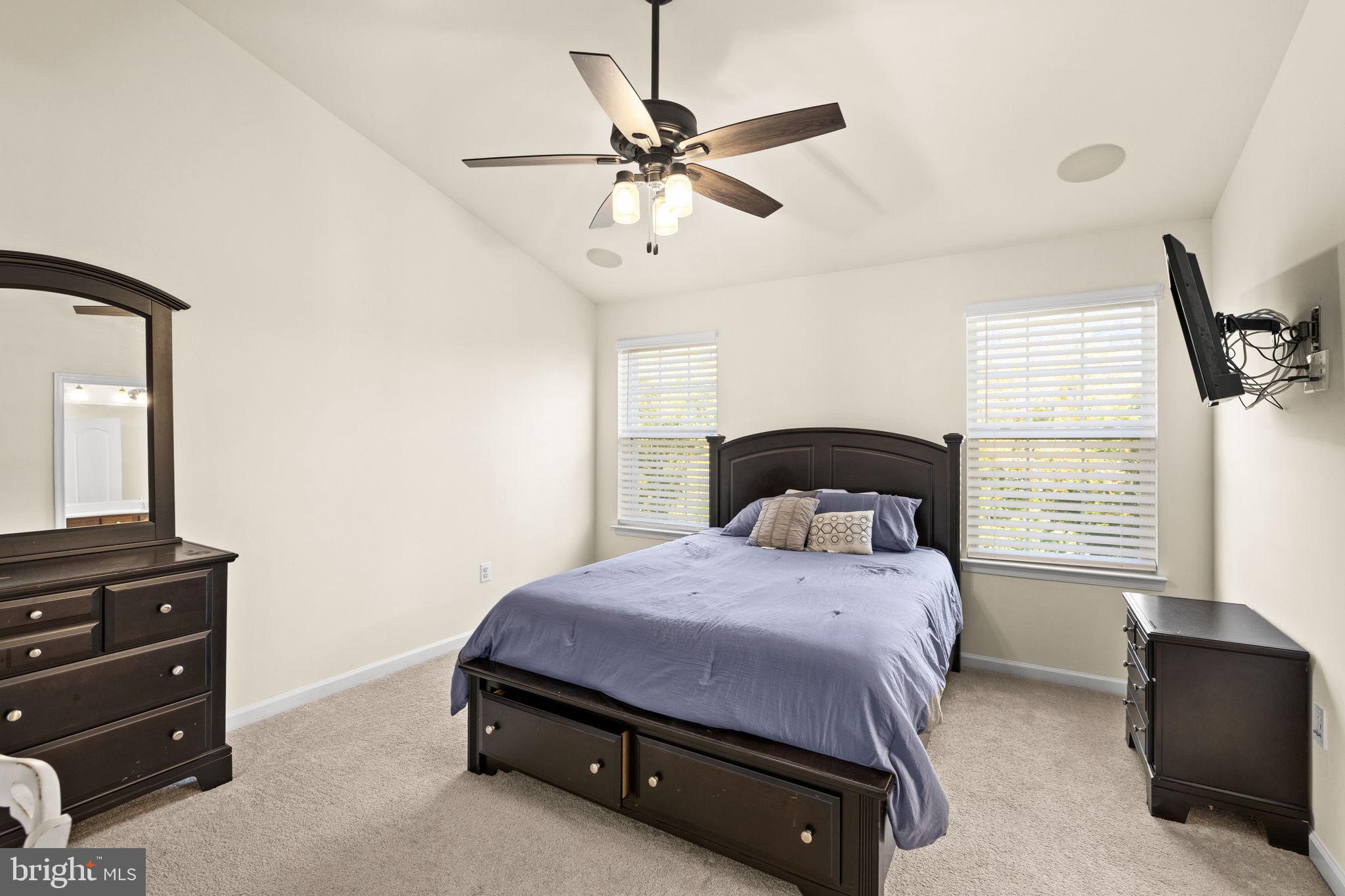 302 Tree Line Drive Fredericksburg, VA 22405 - Photo 32 of 38 a bedroom with a bed dresser and a window