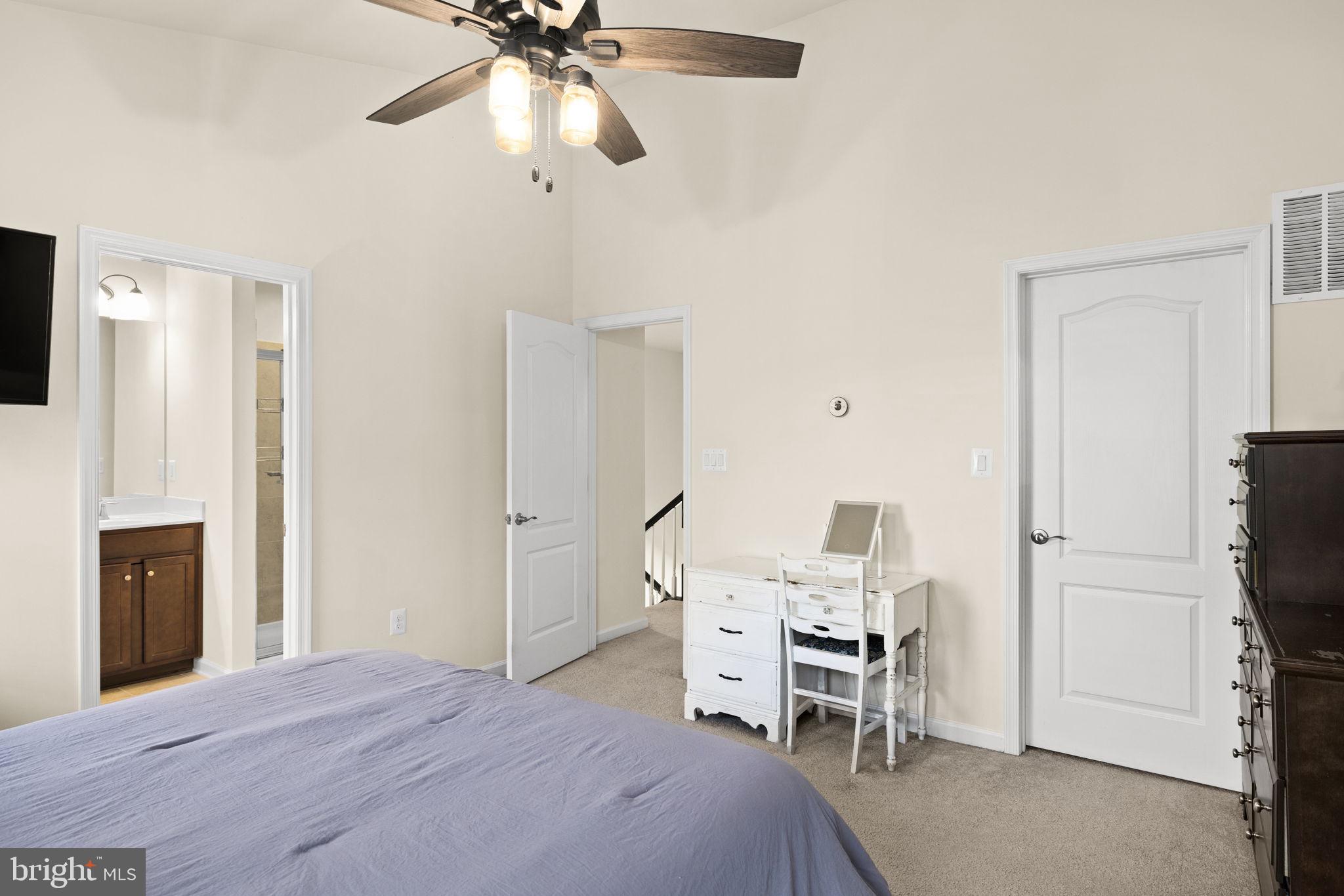 302 Tree Line Drive Fredericksburg, VA 22405 - Photo 34 of 38 a bedroom with furniture and a fireplace