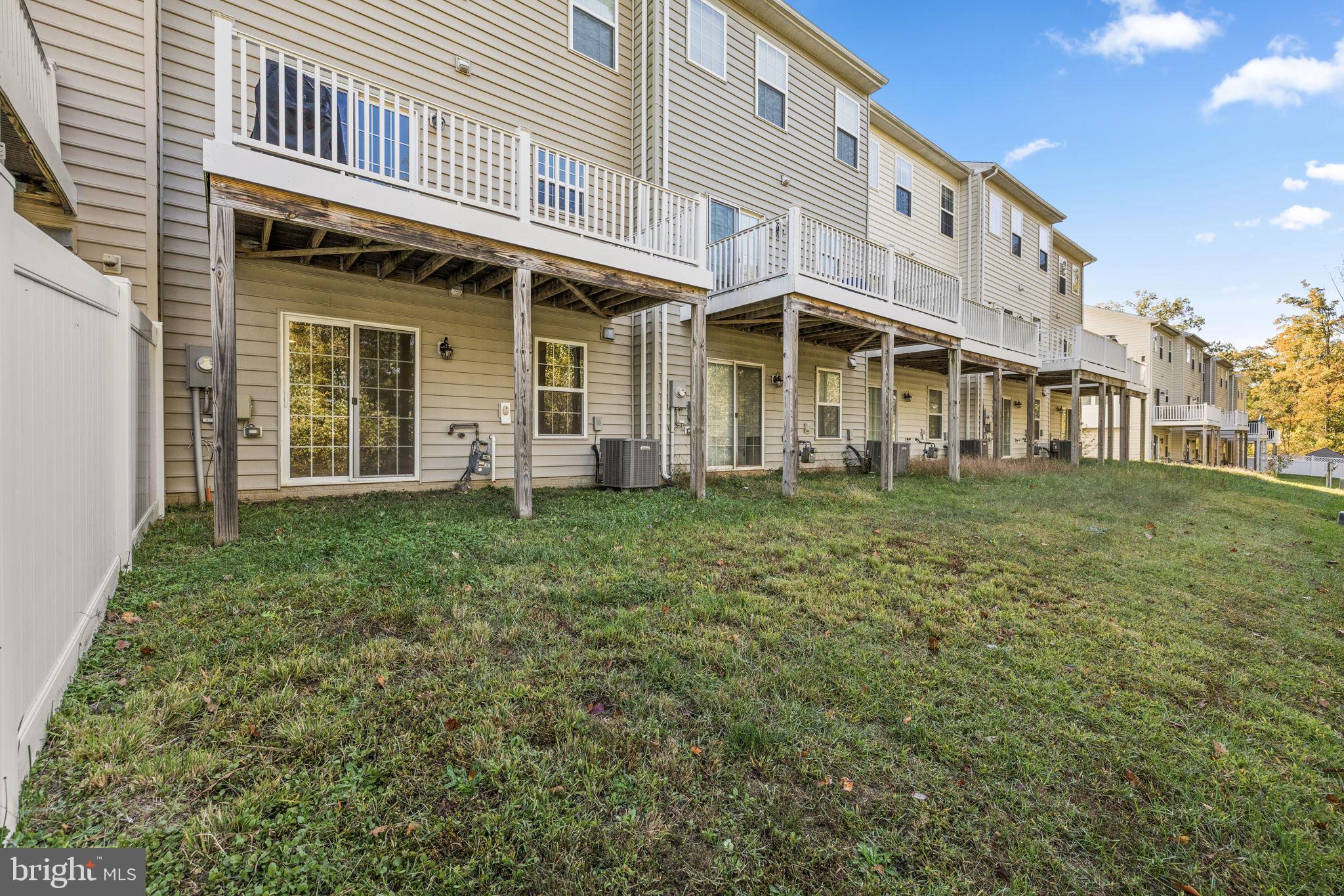 302 Tree Line Drive Fredericksburg, VA 22405 - Photo 6 of 38 a front view of a house with garden