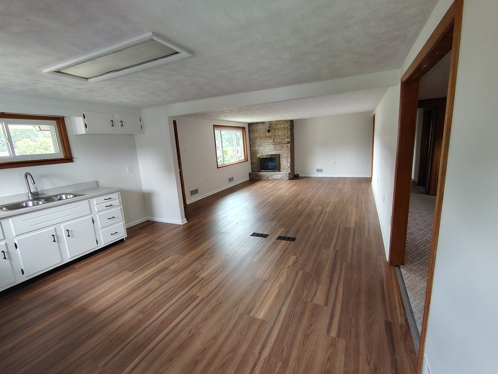 1018 Lawsonham Road Rimersburg, PA 16248 - Photo 13 of 47 a view of a living room hardwood floor and a window