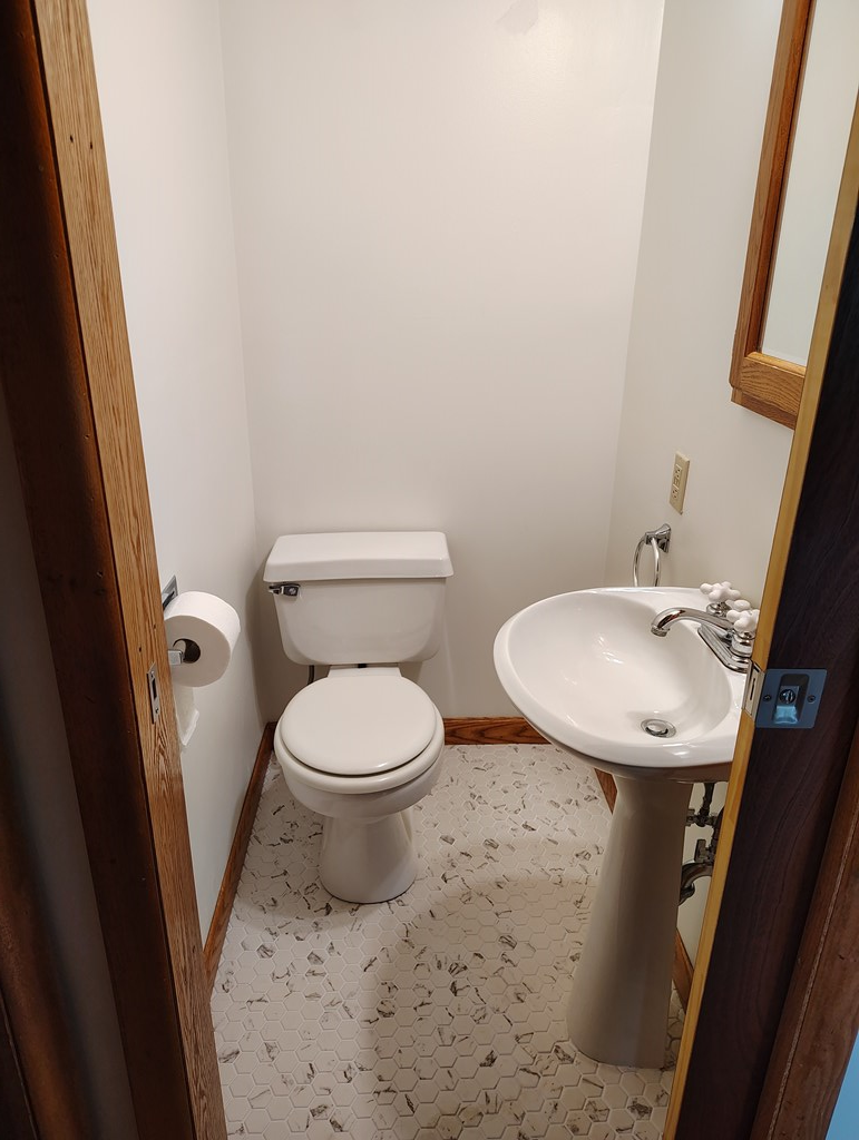 1018 Lawsonham Road Rimersburg, PA 16248 - Photo 25 of 47 a white toilet sitting next to a bathroom sink