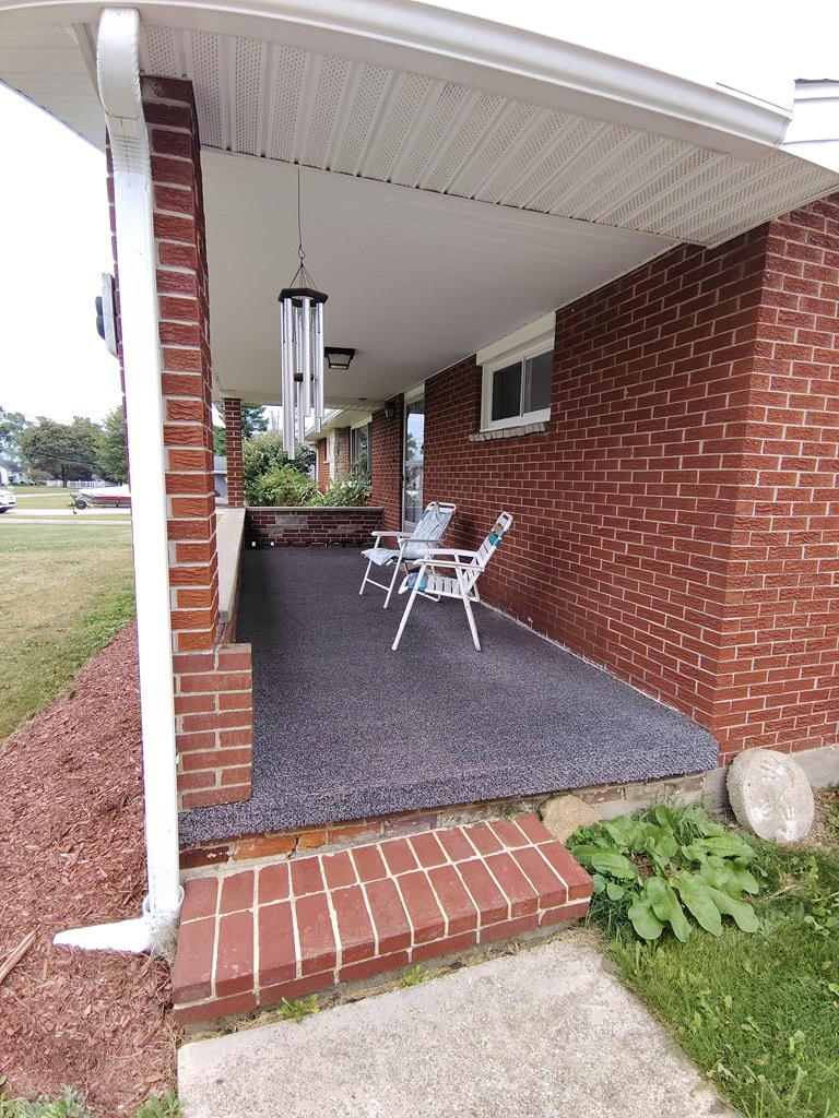 1018 Lawsonham Road Rimersburg, PA 16248 - Photo 42 of 47 a view of a patio with table and chairs with wooden floor and fence