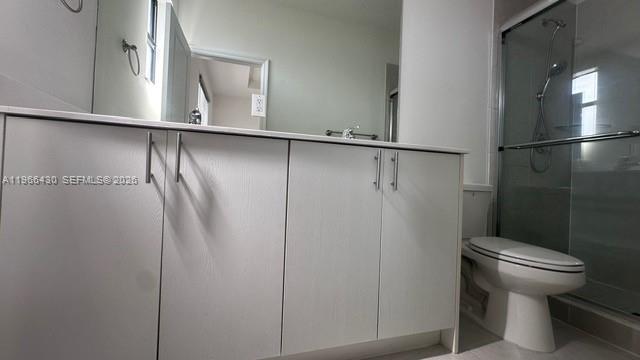 13300 Southwest 286th Street Homestead, FL 33033 - Photo 22 of 48 a bathroom with a toilet and a shower