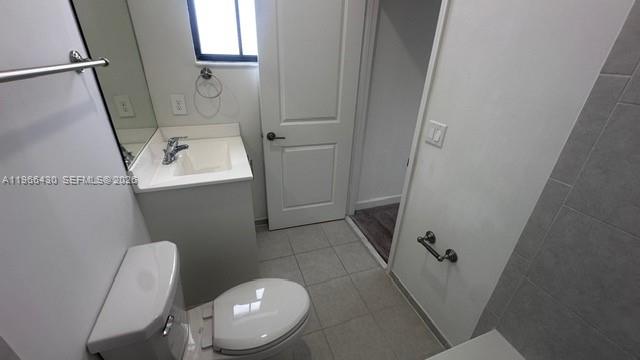13300 Southwest 286th Street Homestead, FL 33033 - Photo 31 of 48 a bathroom with a sink and toilet