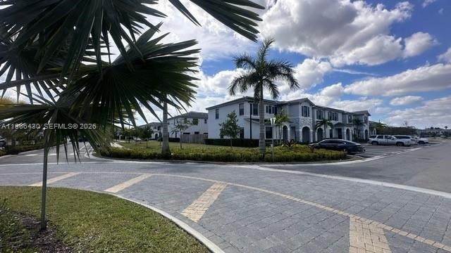 13300 Southwest 286th Street Homestead, FL 33033 - Photo 42 of 48 a front view of a house with a garden
