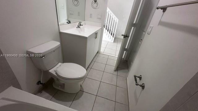 13300 Southwest 286th Street Homestead, FL 33033 - Photo 7 of 48 a white toilet sitting next to a bathroom sink