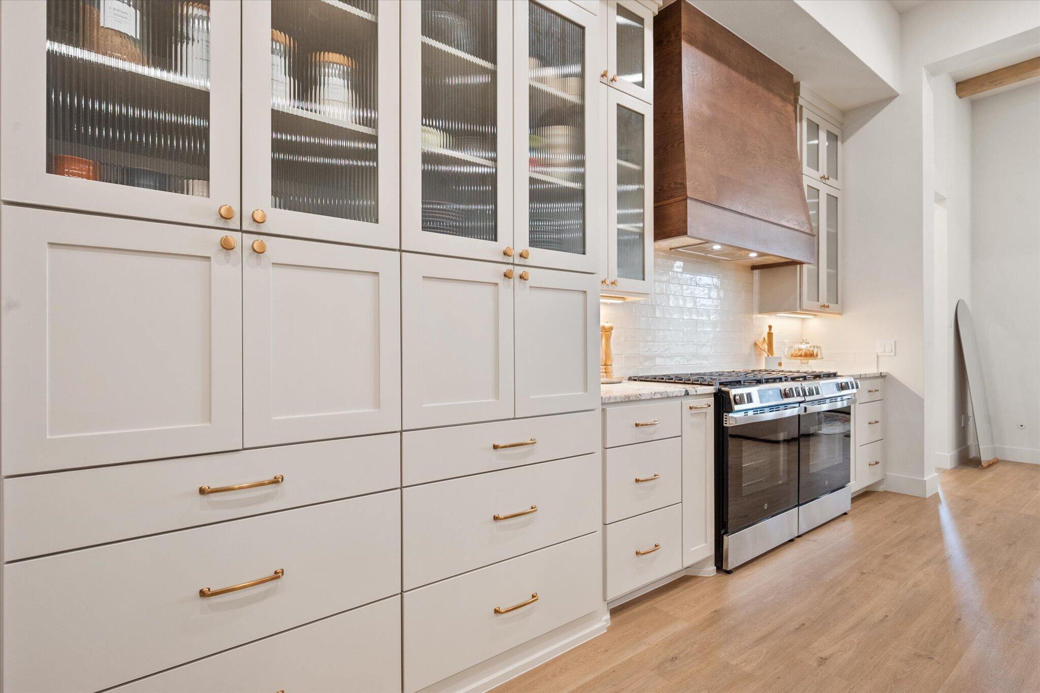 4026 136th Street Lubbock, TX 79423 - Photo 14 of 40 a kitchen with cabinets and appliances