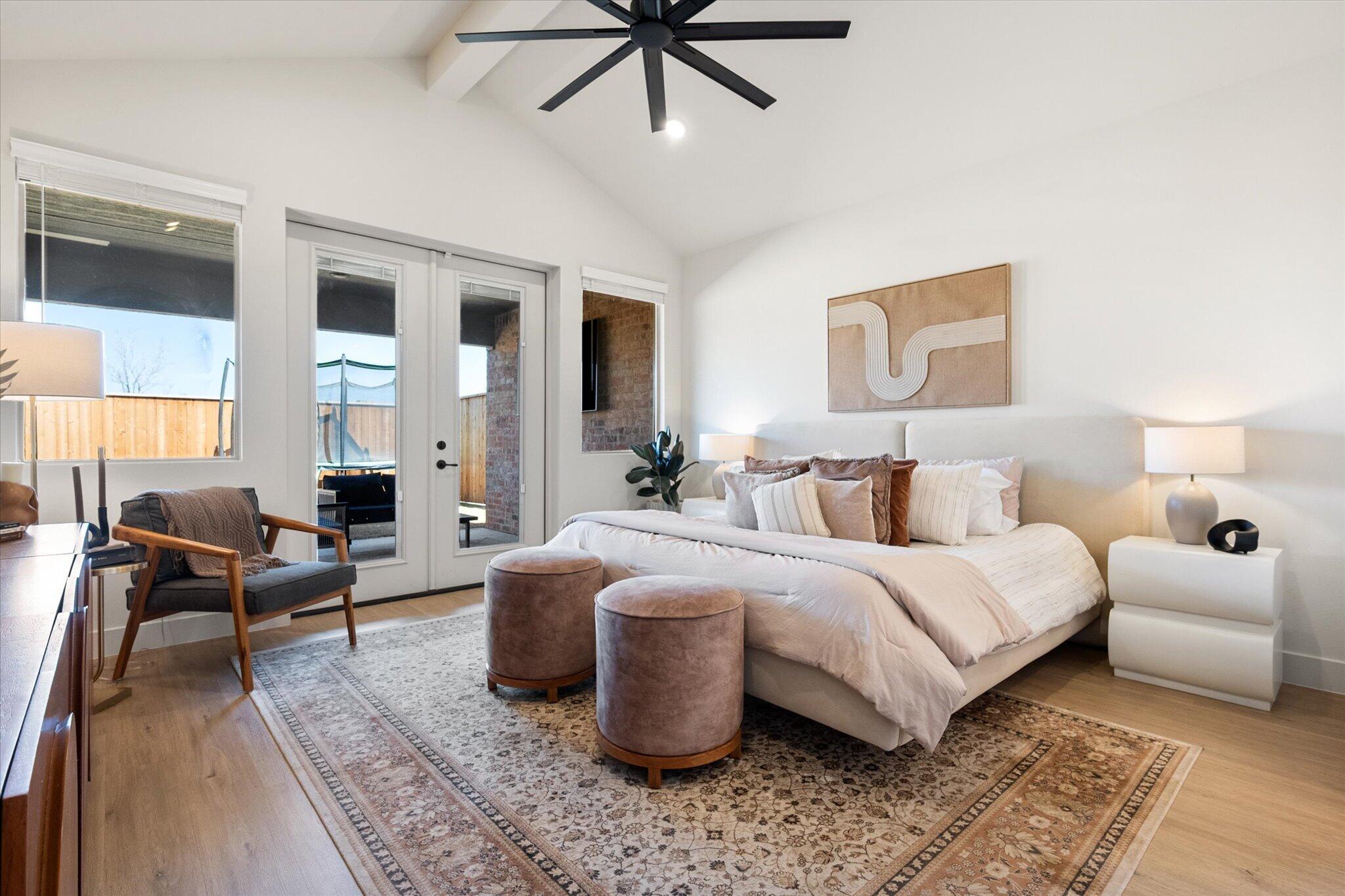 4026 136th Street Lubbock, TX 79423 - Photo 30 of 40 a bedroom with furniture and a rug