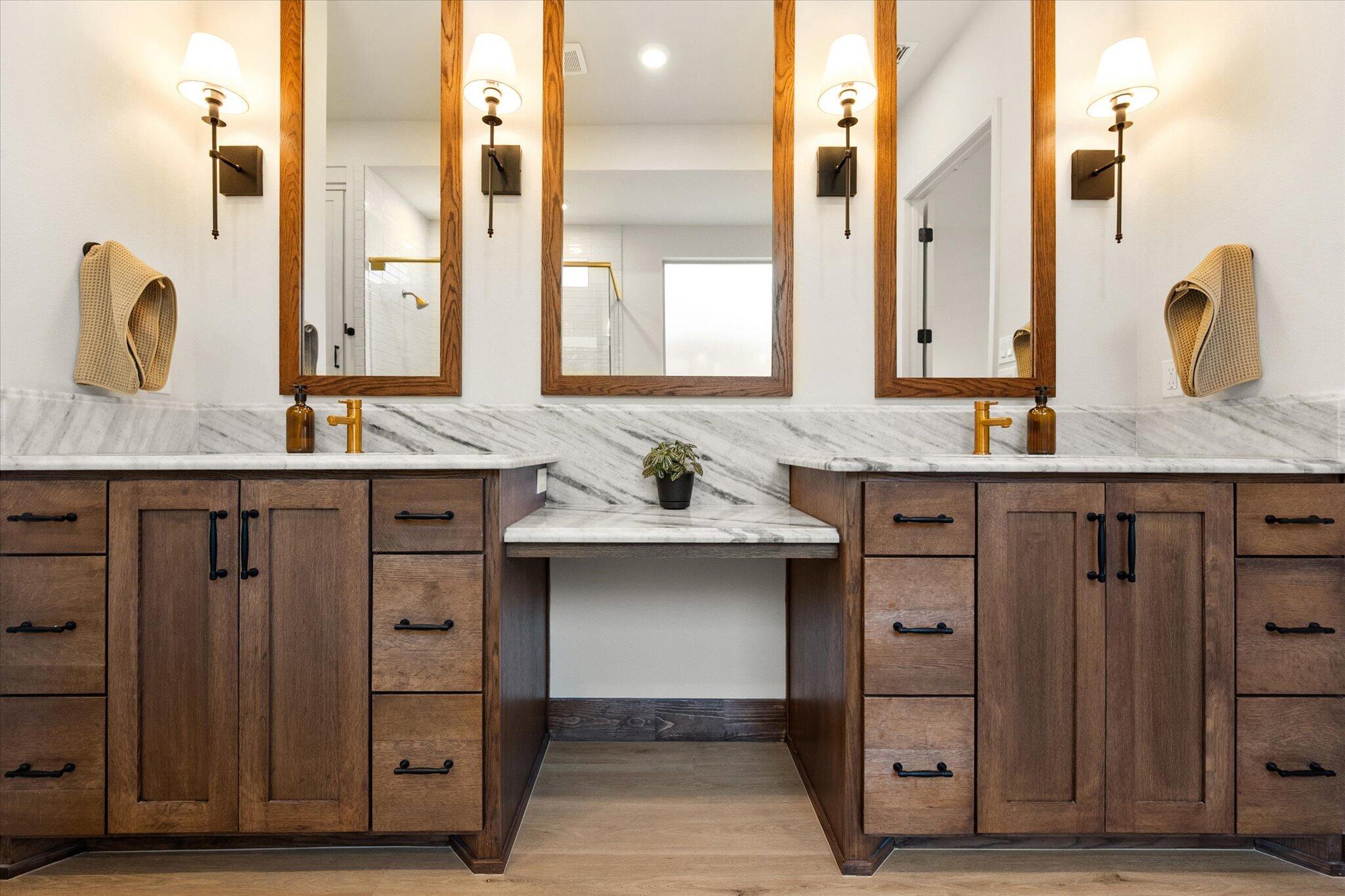 4026 136th Street Lubbock, TX 79423 - Photo 33 of 40 a bathroom with a granite countertop sink and a mirror