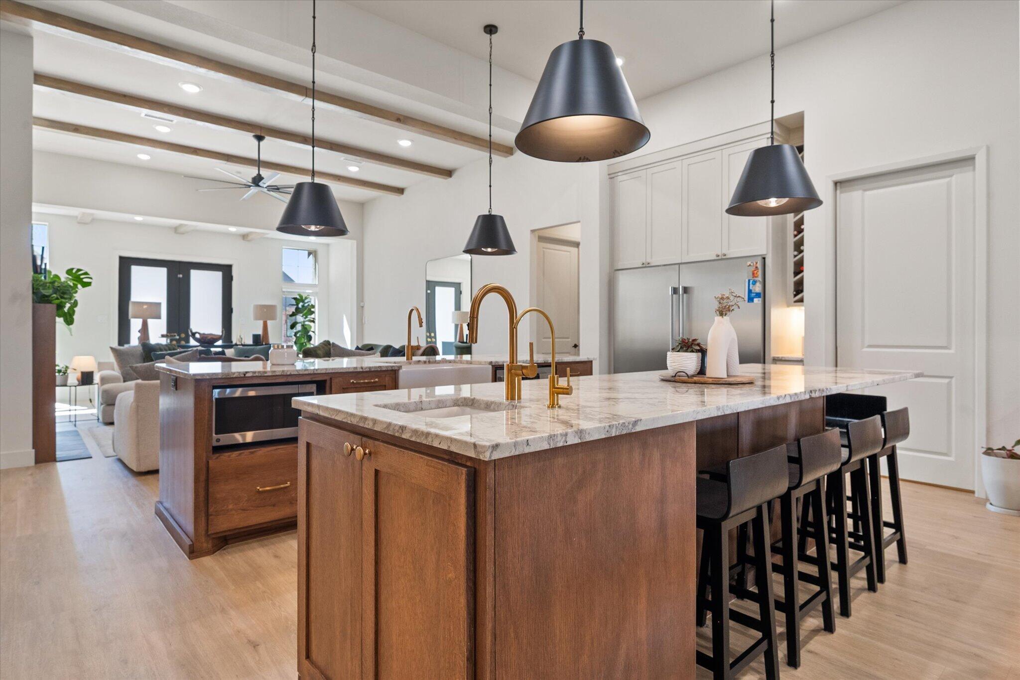 4026 136th Street Lubbock, TX 79423 - Photo 10 of 40 a kitchen with a counter space a sink appliances and cabinets