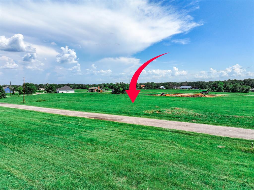 Tbd4 Cedar Elm Road Trinidad, TX 75163 - Photo 3 of 8 a view of a golf course with a swimming pool