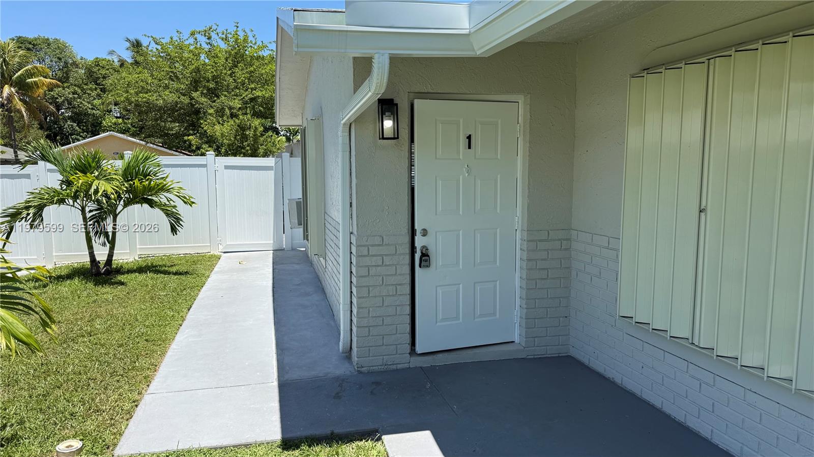 a view of a back yard from a room