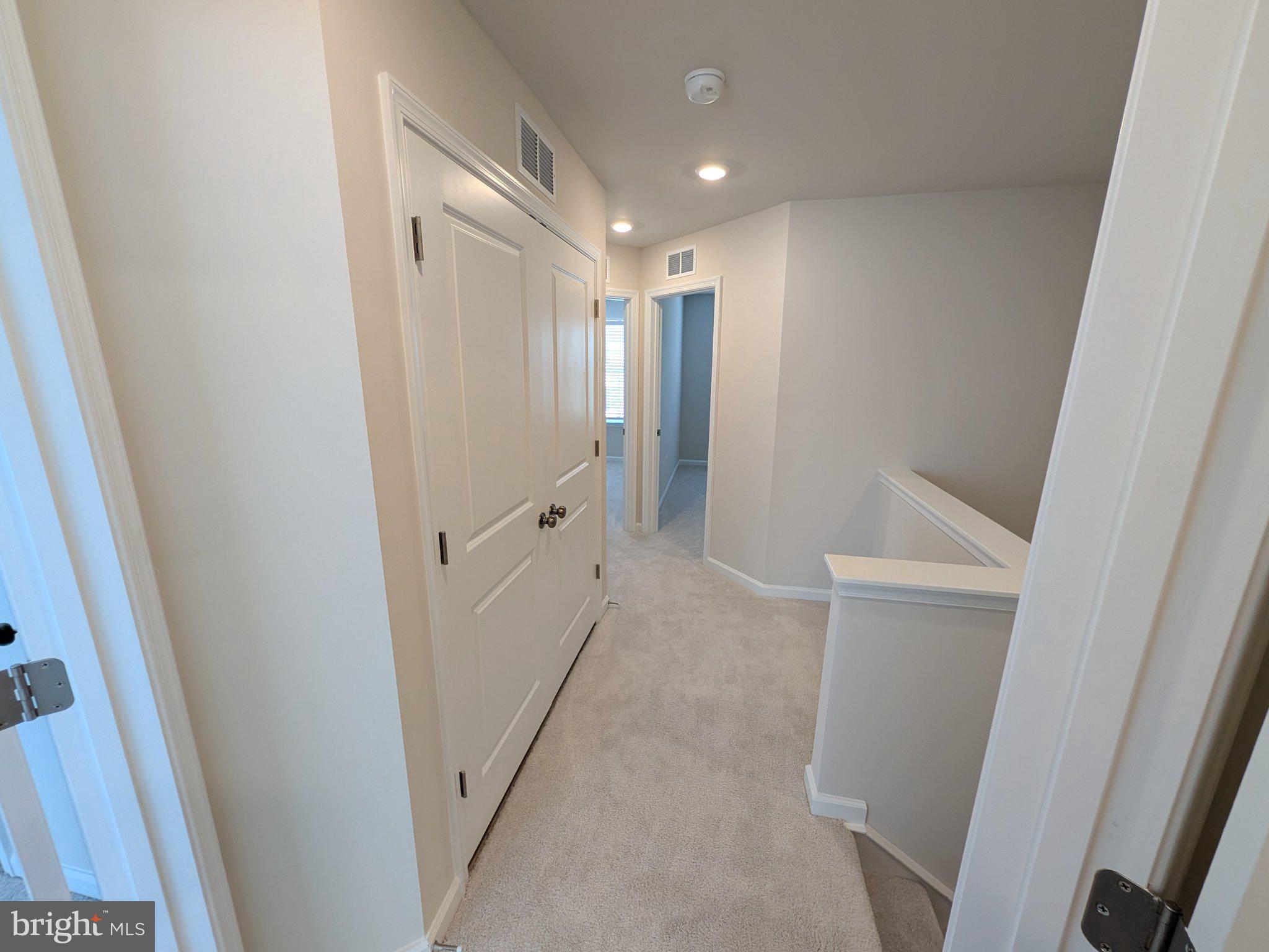 278 Swan Fld Avenue Ranson, WV 25438 - Photo 27 of 33 Bright and inviting hallway retreat.