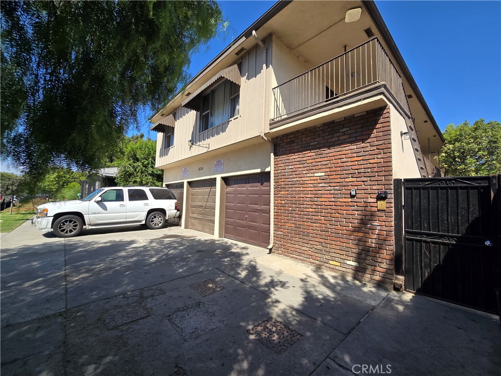 1834 Pine Avenue, Unit 5 Long Beach, CA 90806 - Photo 11 of 11 a view of a car park in front of house