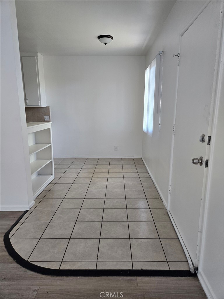 1834 Pine Avenue, Unit 5 Long Beach, CA 90806 - Photo 5 of 11 a view of wooden floor in an empty room
