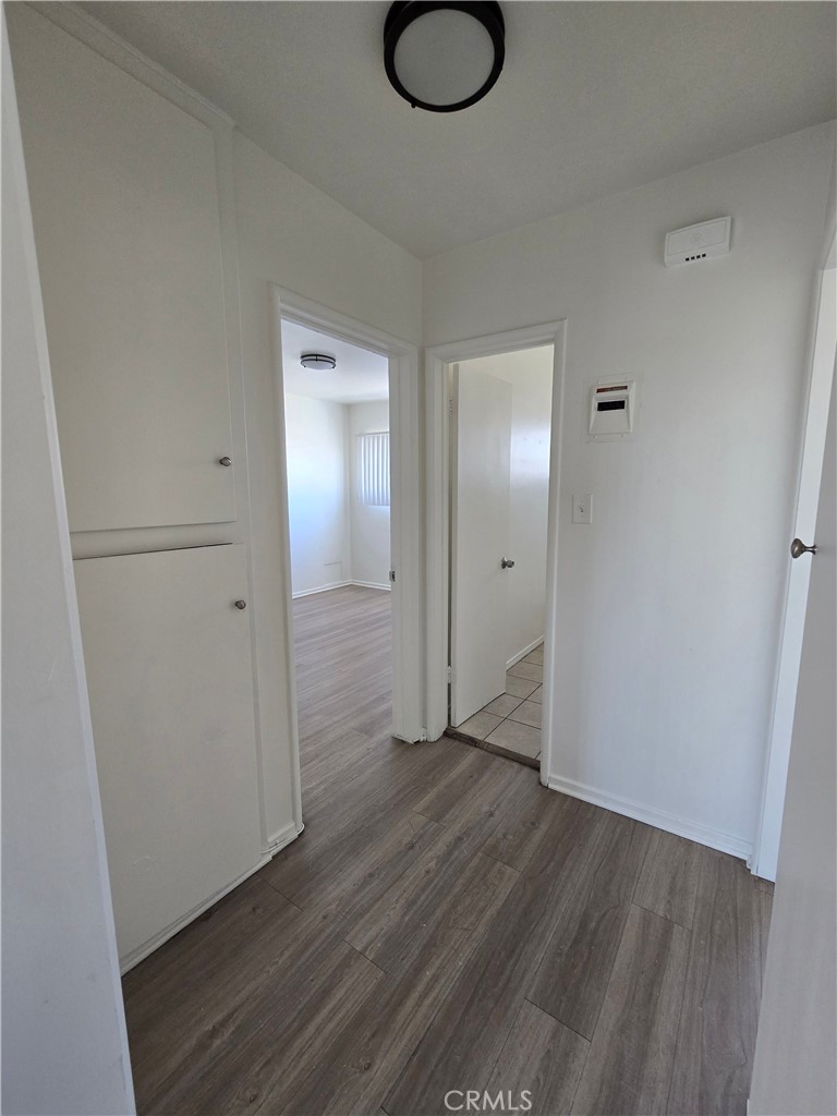 1834 Pine Avenue, Unit 5 Long Beach, CA 90806 - Photo 8 of 11 a view of a livingroom with wooden floor