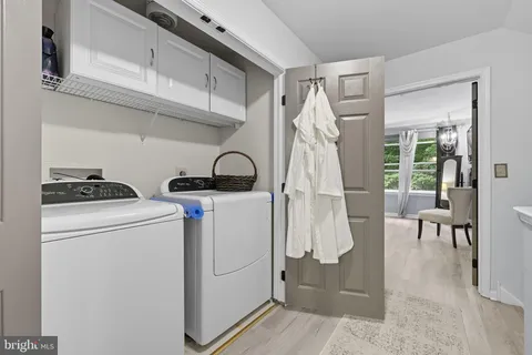 a storage room with washer and dryer