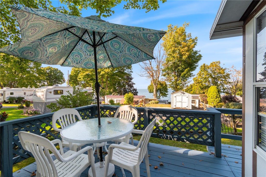 7945 Lake Road, Unit 16 Sodus, NY 14555 - Photo 2 of 20 Enjoy cocktails and company on one of the TWO seat