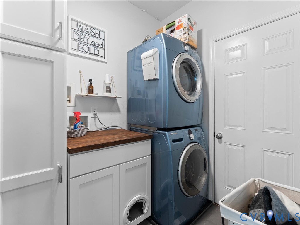7434 South Franklins Way Quinton, VA 23141 - Photo 25 of 31 Dedicated laundry area featuring a stacked washer