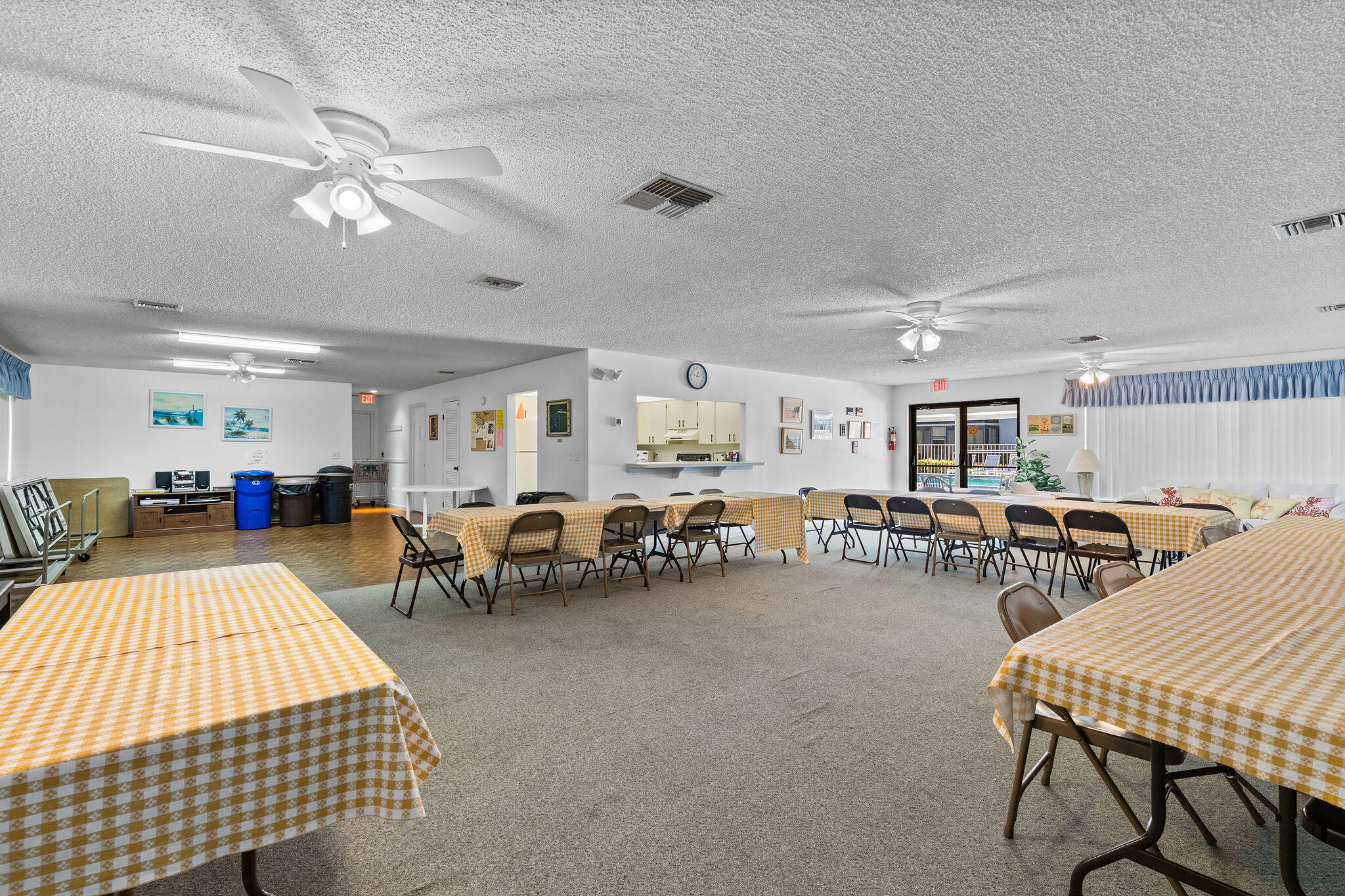 3799 South Banana River Boulevard, Unit 512 Cocoa Beach, FL 32931 - Photo 28 of 34 a living room with chairs and a table