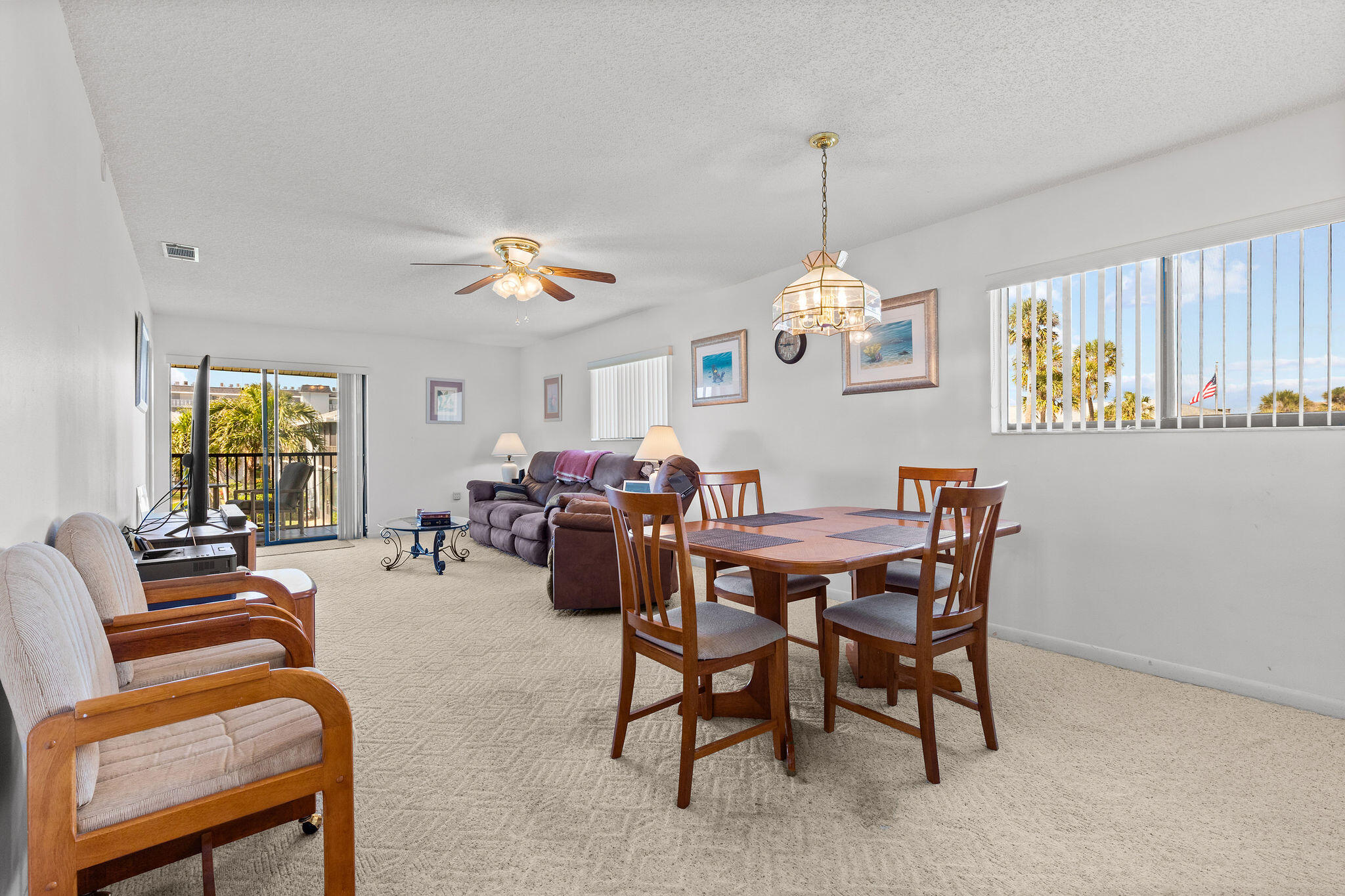 3799 South Banana River Boulevard, Unit 512 Cocoa Beach, FL 32931 - Photo 6 of 34 a view of a livingroom with furniture and window