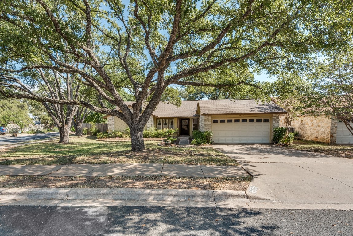 a house with trees in front of it