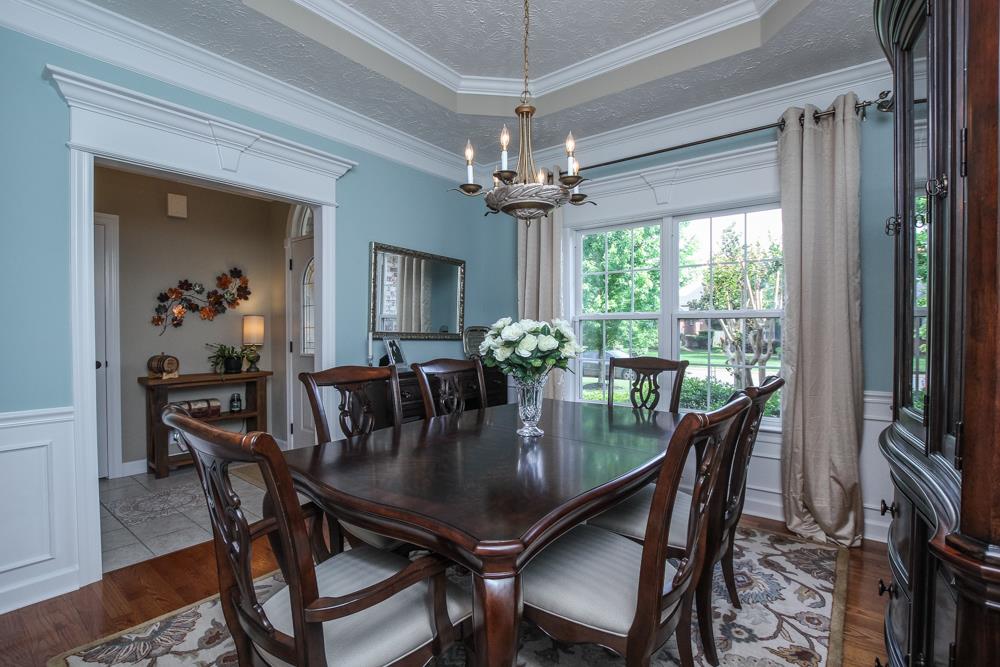 210 Black Bear Trail Murfreesboro, TN 37127 - Photo 5 of 27 a view of a dining room with furniture a chandelier and wooden floor