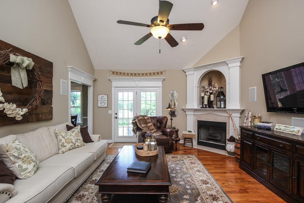 210 Black Bear Trail Murfreesboro, TN 37127 - Photo 7 of 27 a living room with furniture fireplace and flat screen tv