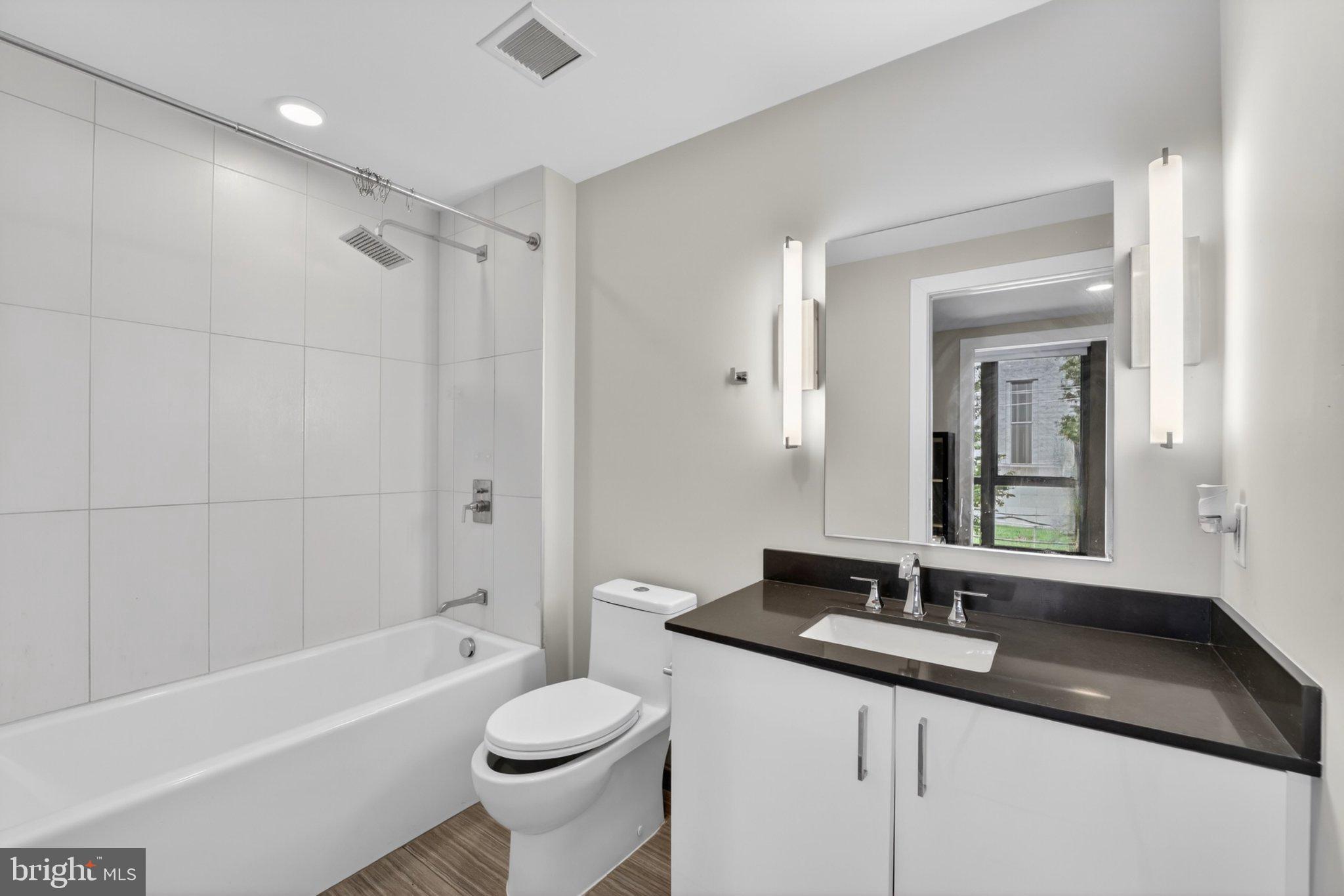 88 V Street Southwest, Unit 213 Washington, DC 20024 - Photo 23 of 26 Sleek modern bathroom oasis.