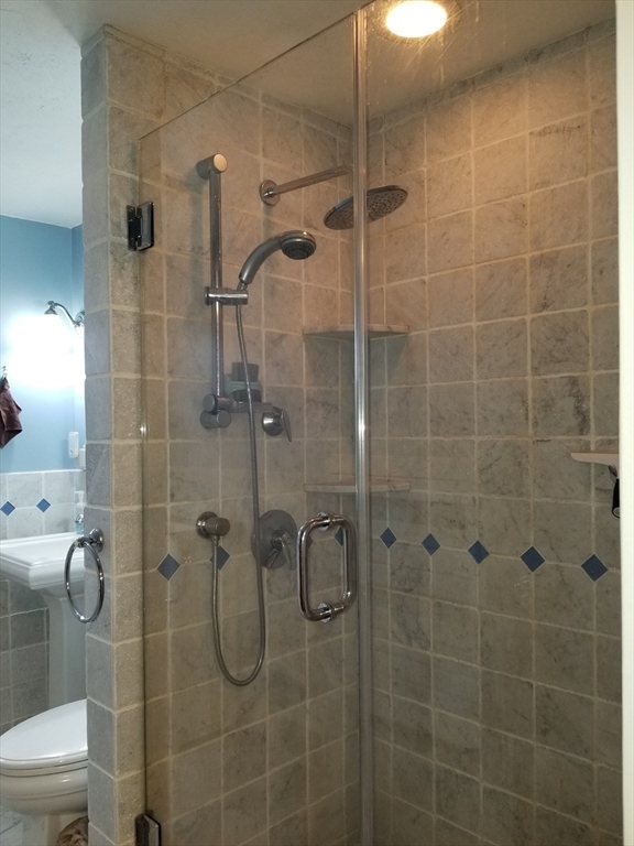 225 Governors Road, Unit 225 Quincy, MA 02169 - Photo 11 of 19 a bathroom with a shower