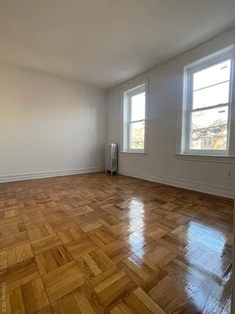 a view of an empty room and window