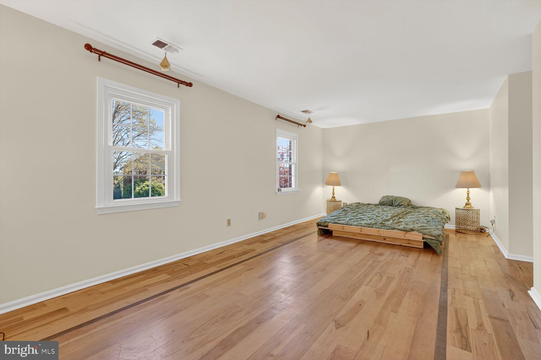 20080 Doolittle Street Gaithersburg, MD 20886 - Photo 19 of 48 a room with window and a wooden floor