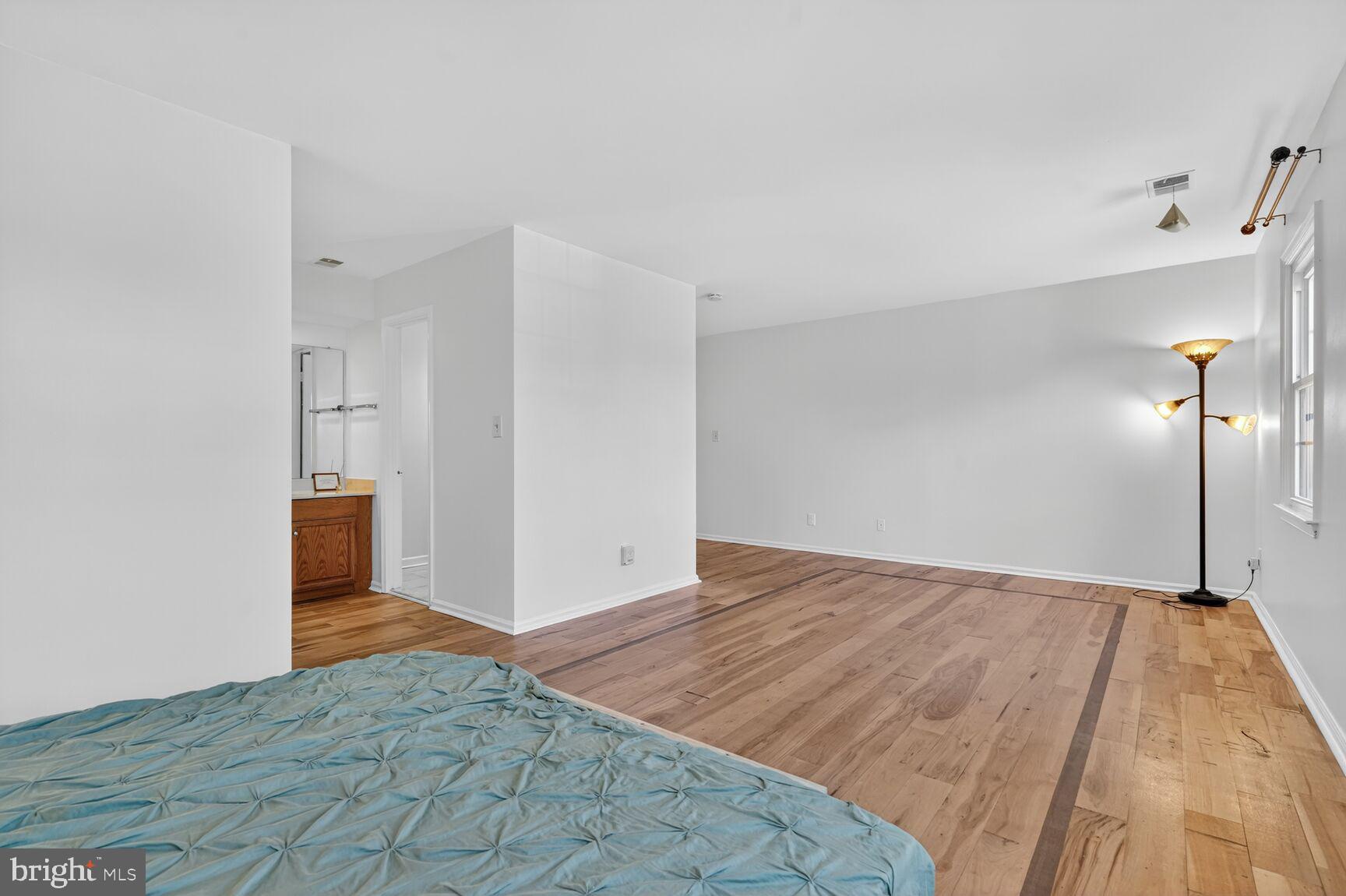 20080 Doolittle Street Gaithersburg, MD 20886 - Photo 20 of 48 a view of a room with wooden floor
